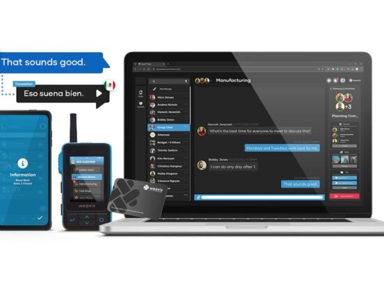 Cover image for a blog on enterprise-wide collaboration featuring the Walt smart radio, mobile app, desktop console, and NPC badge, all of which make up the Walt Smart Radio System. In this image, Walt is shown performing real-time translation and transcription through AI.