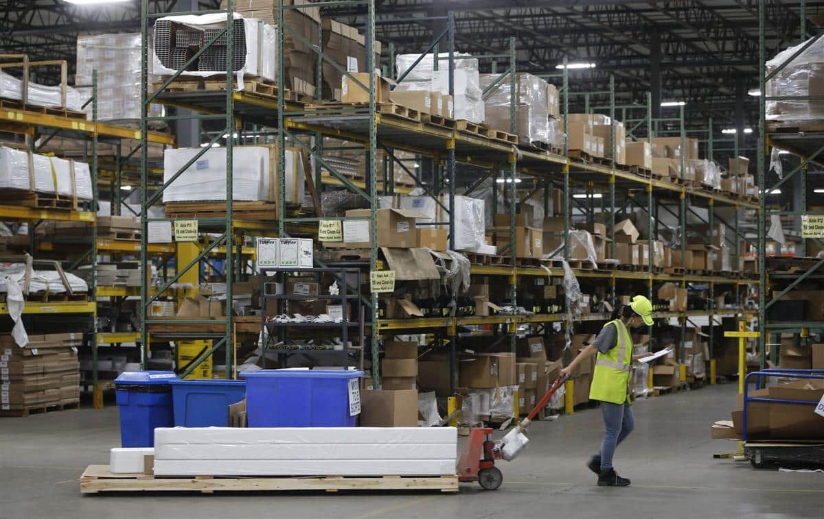 CertainTeed frontline worker in a facility