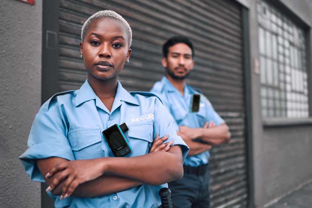 Security guards with a walt Smart Radio
