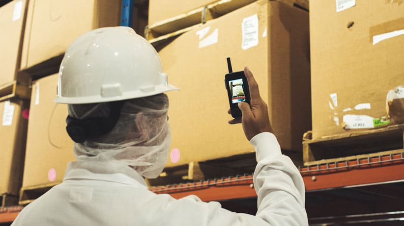 Warehouse worker taking a picture