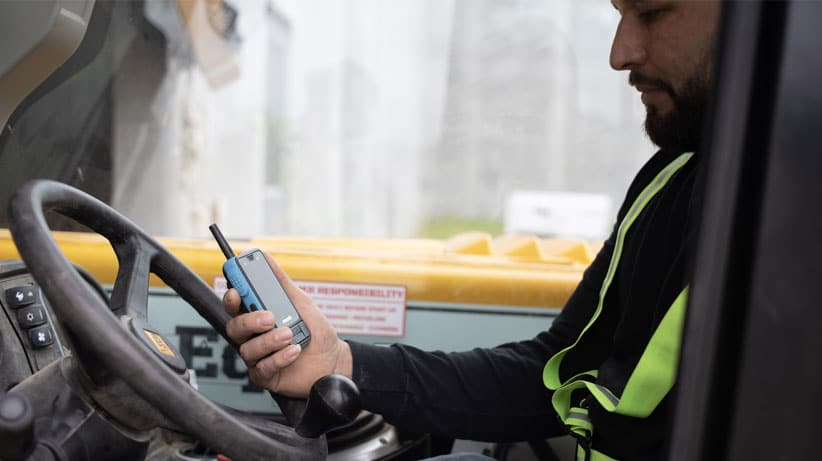 Driver looking at a Walt Smart Radio