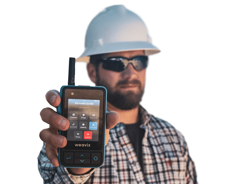 A worker showing a paging menu screen on a Walt Smart Radio by weavix